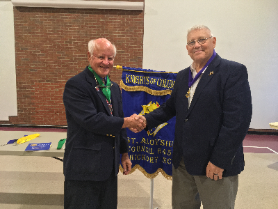 Worthy Trustee Bob Hall Congratulates Worhty Grand Knight George Brown on his Reinduction for the Fraternal Year 2021-2022